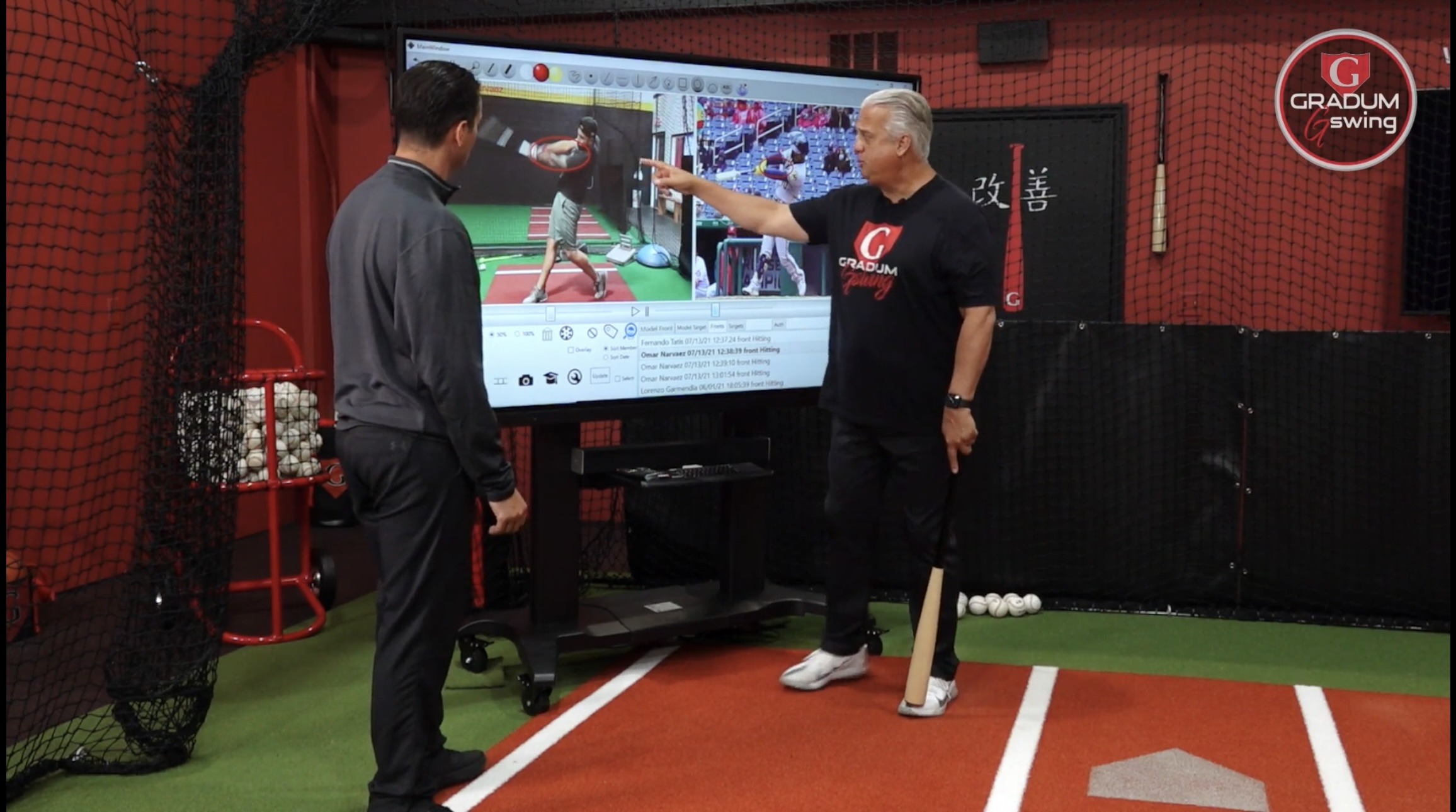 A Gswing Certified Instructor explaining swing footage